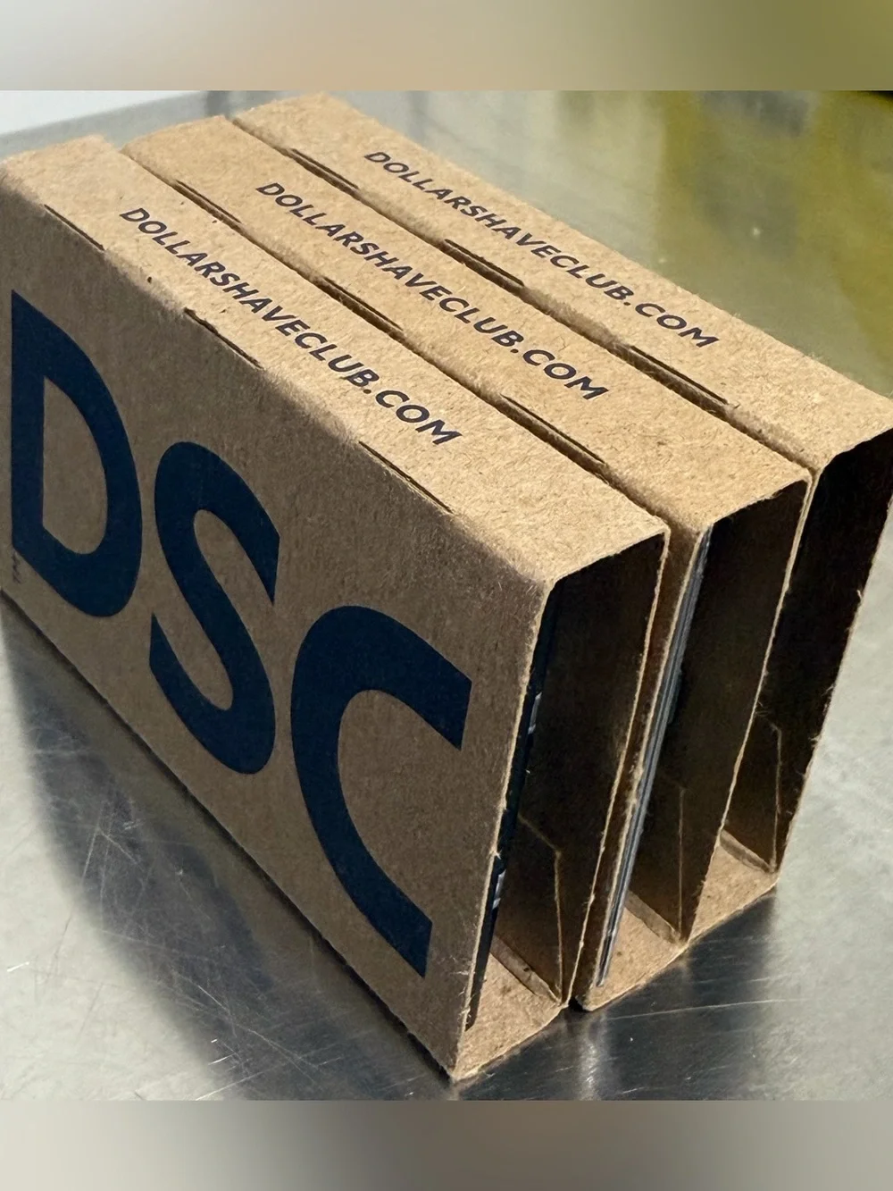 (12) DOLLAR SHAVE CLUB 